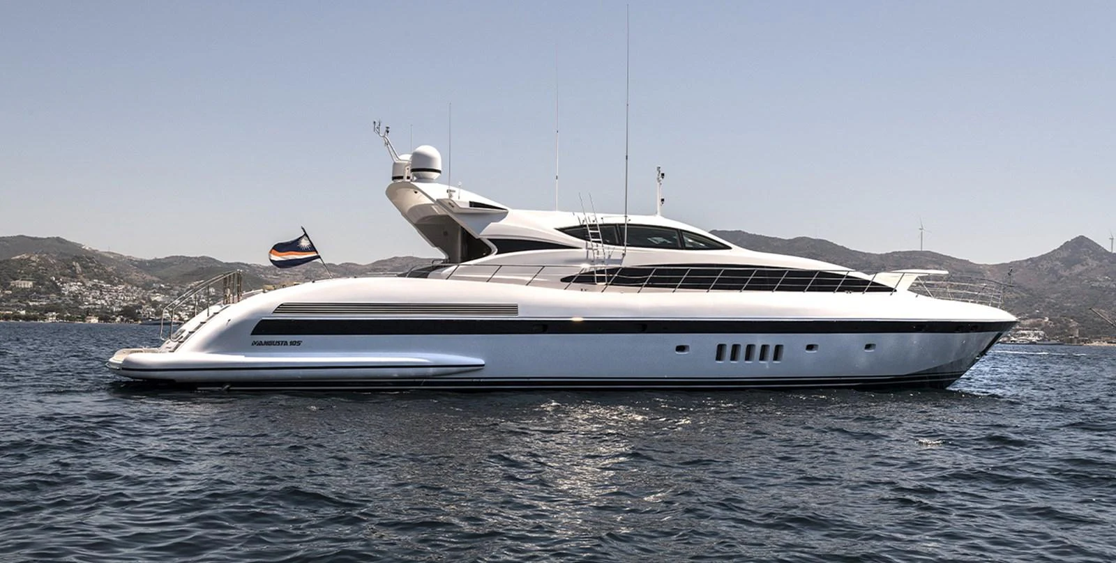 a white yacht in the water aboard DANUSH Yacht for Sale