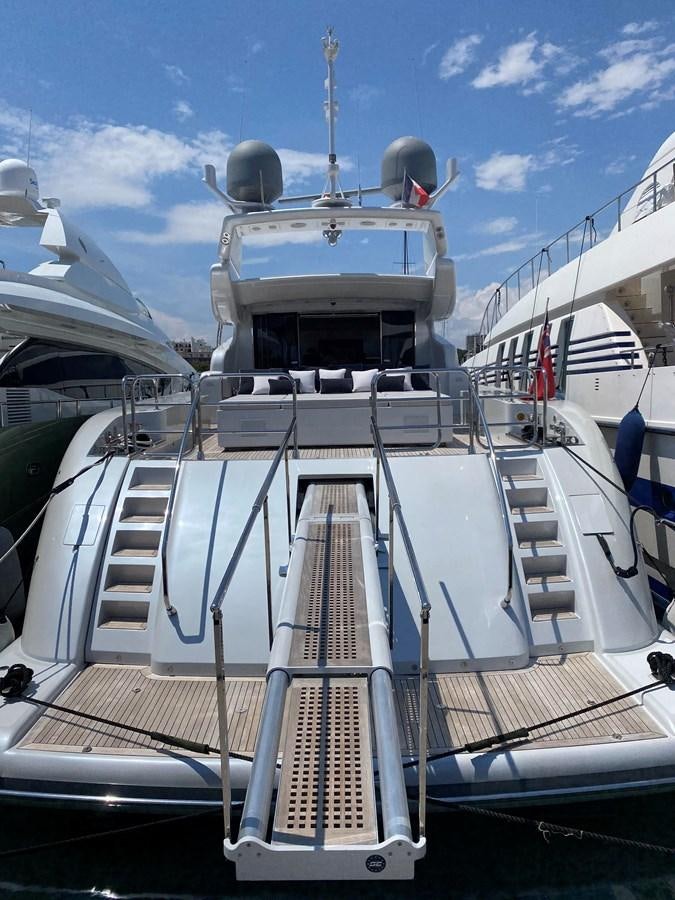 a white boat with a metal railing aboard JADE Yacht for Sale