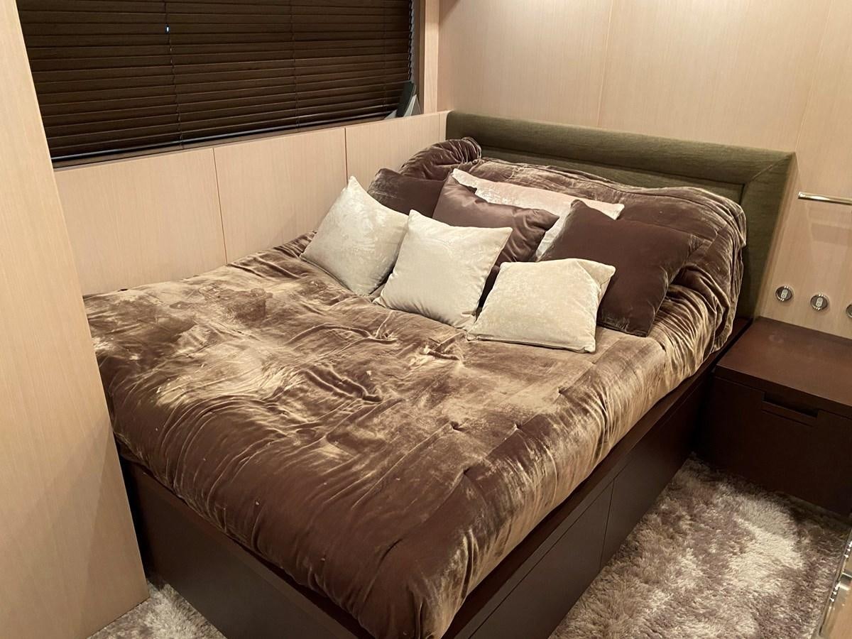 a bed with pillows aboard JADE Yacht for Sale