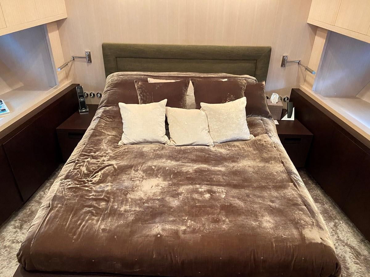 a bed with pillows aboard JADE Yacht for Sale