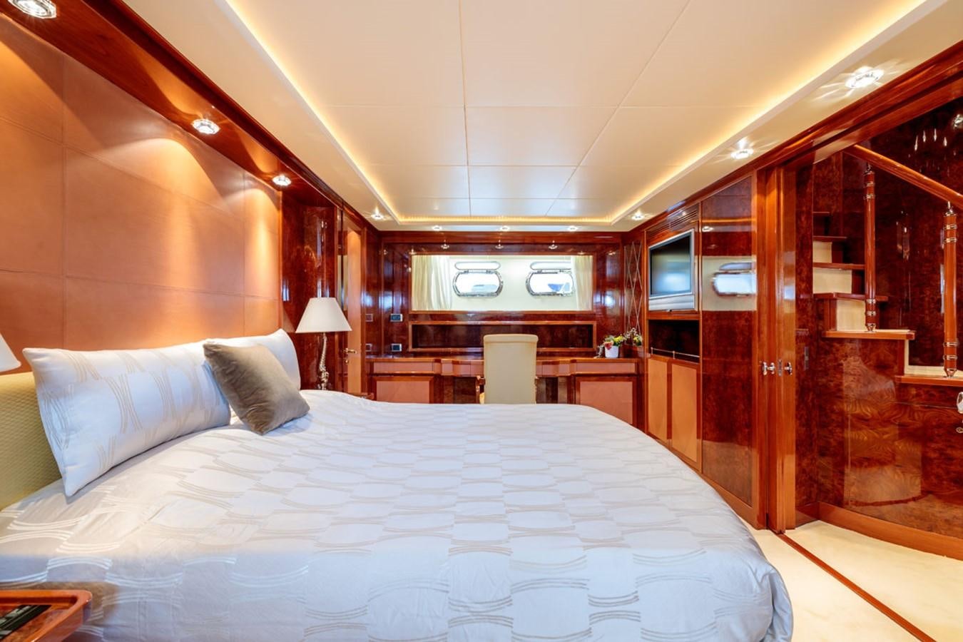 a bed in a room aboard PARAM JAMUNA III Yacht for Sale