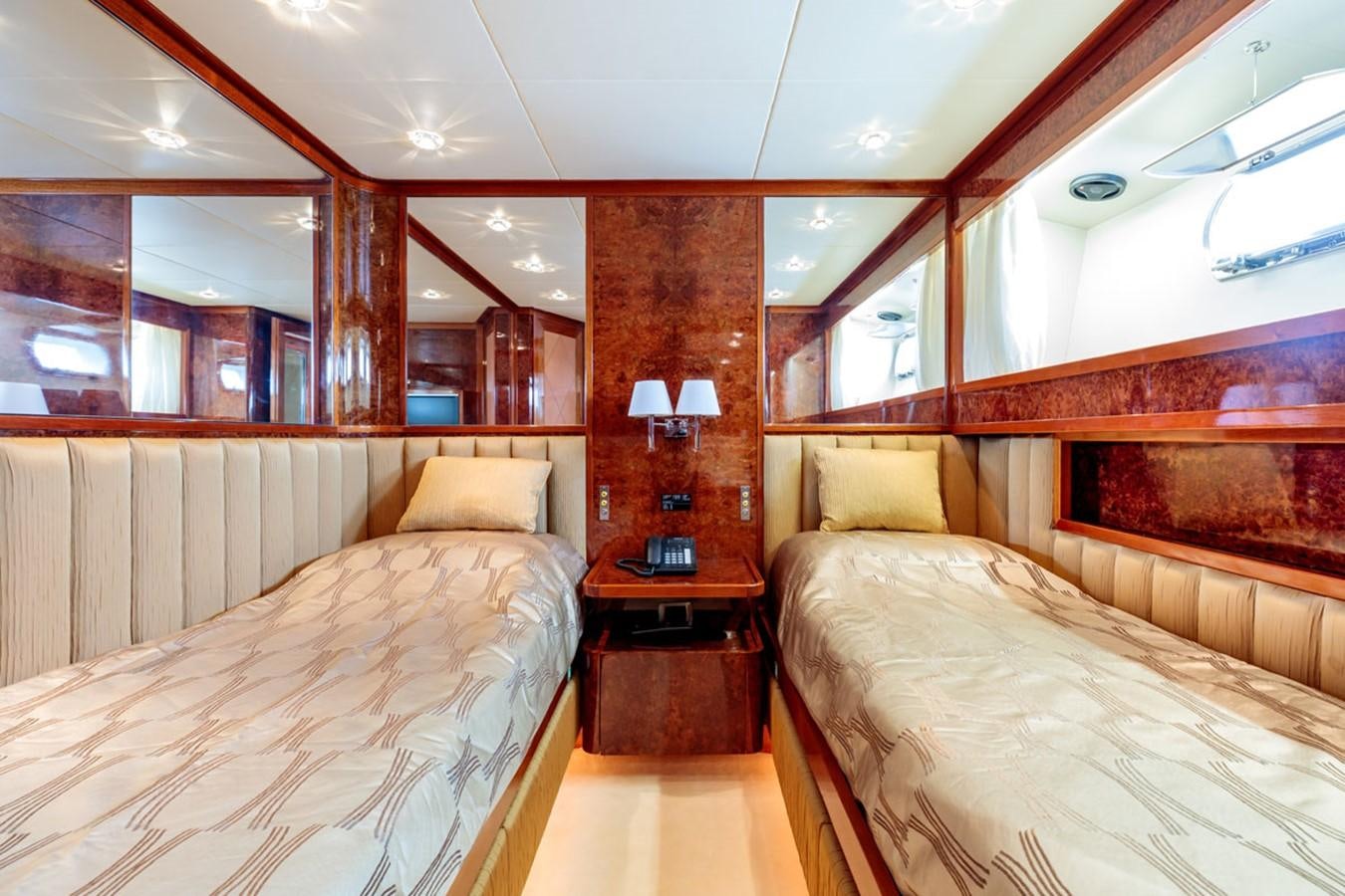 a room with two beds aboard PARAM JAMUNA III Yacht for Sale