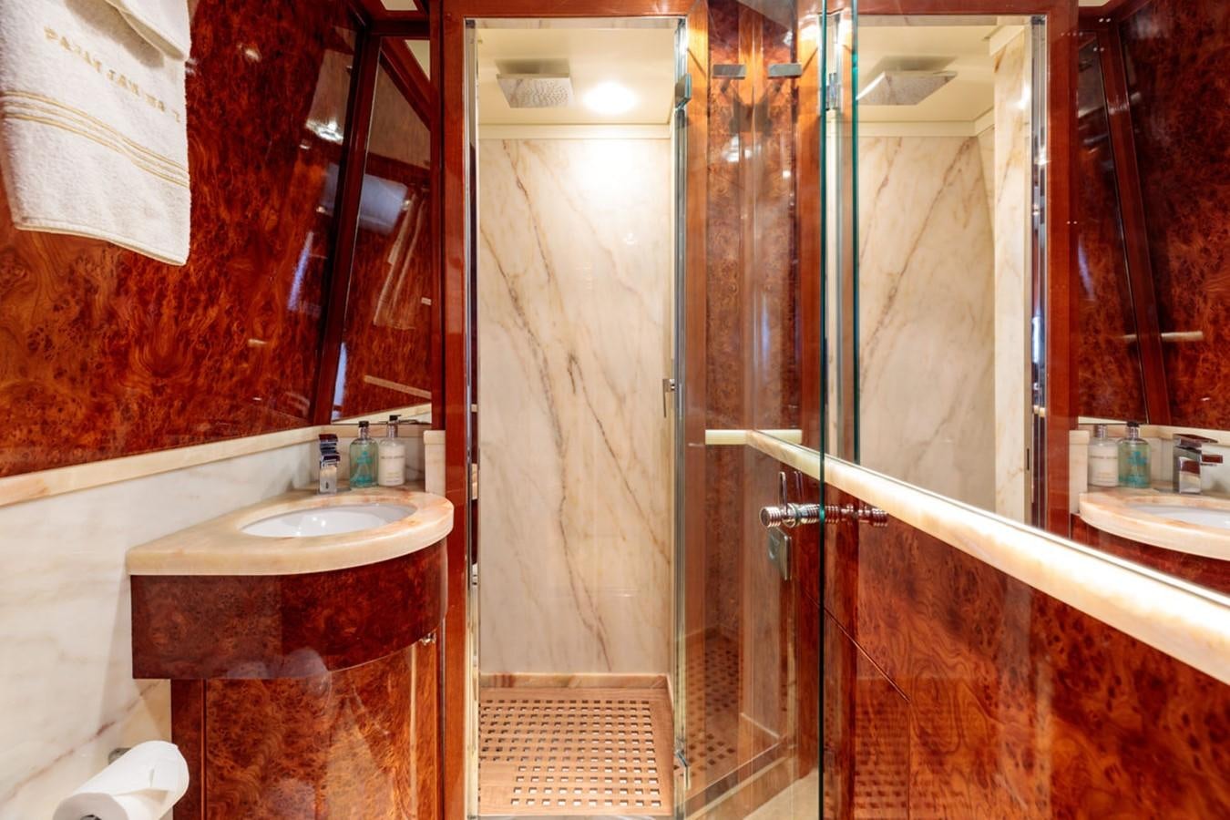 a bathroom with a sink and a shower aboard PARAM JAMUNA III Yacht for Sale