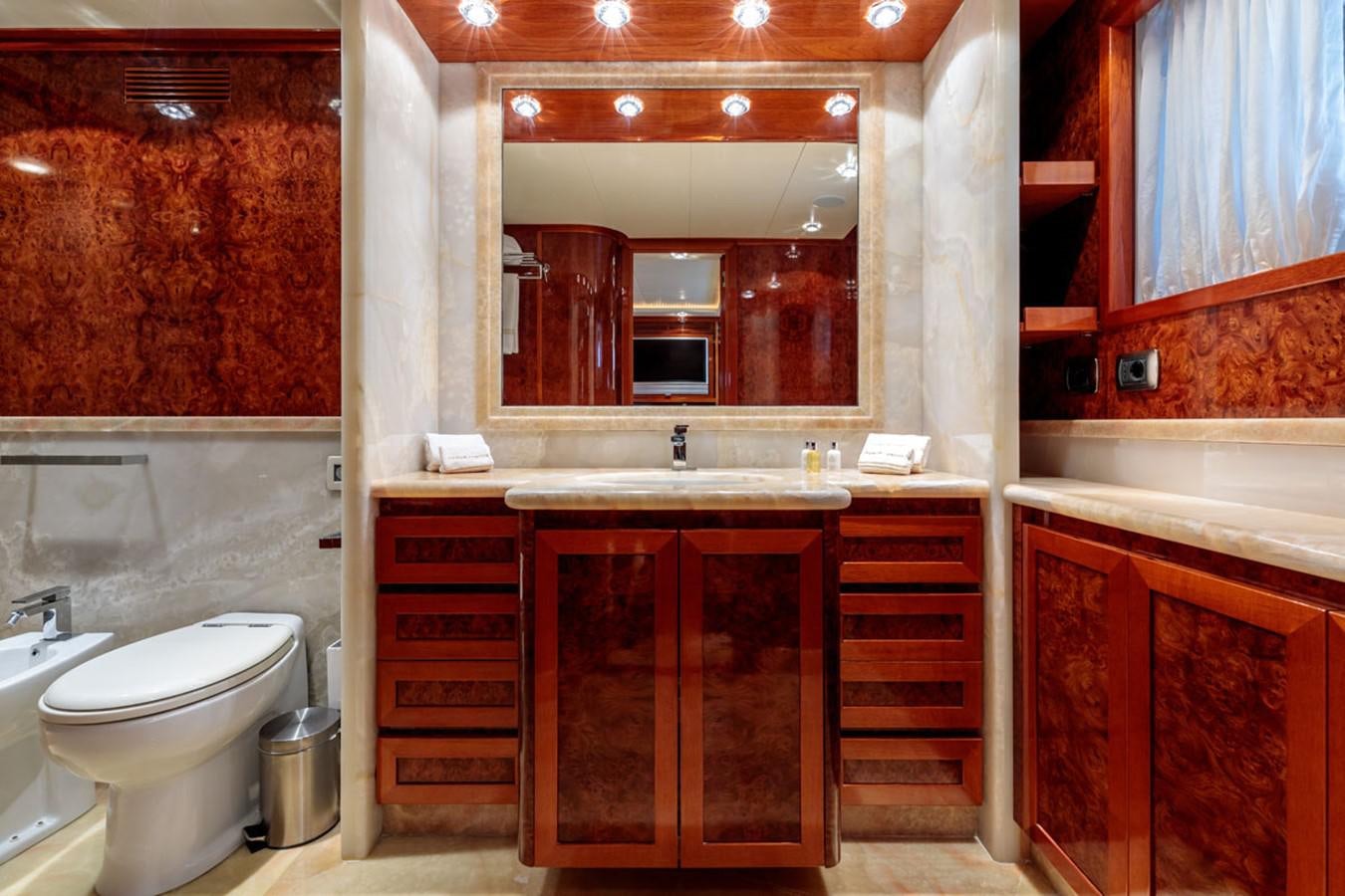a bathroom with a sink and a toilet aboard PARAM JAMUNA III Yacht for Sale