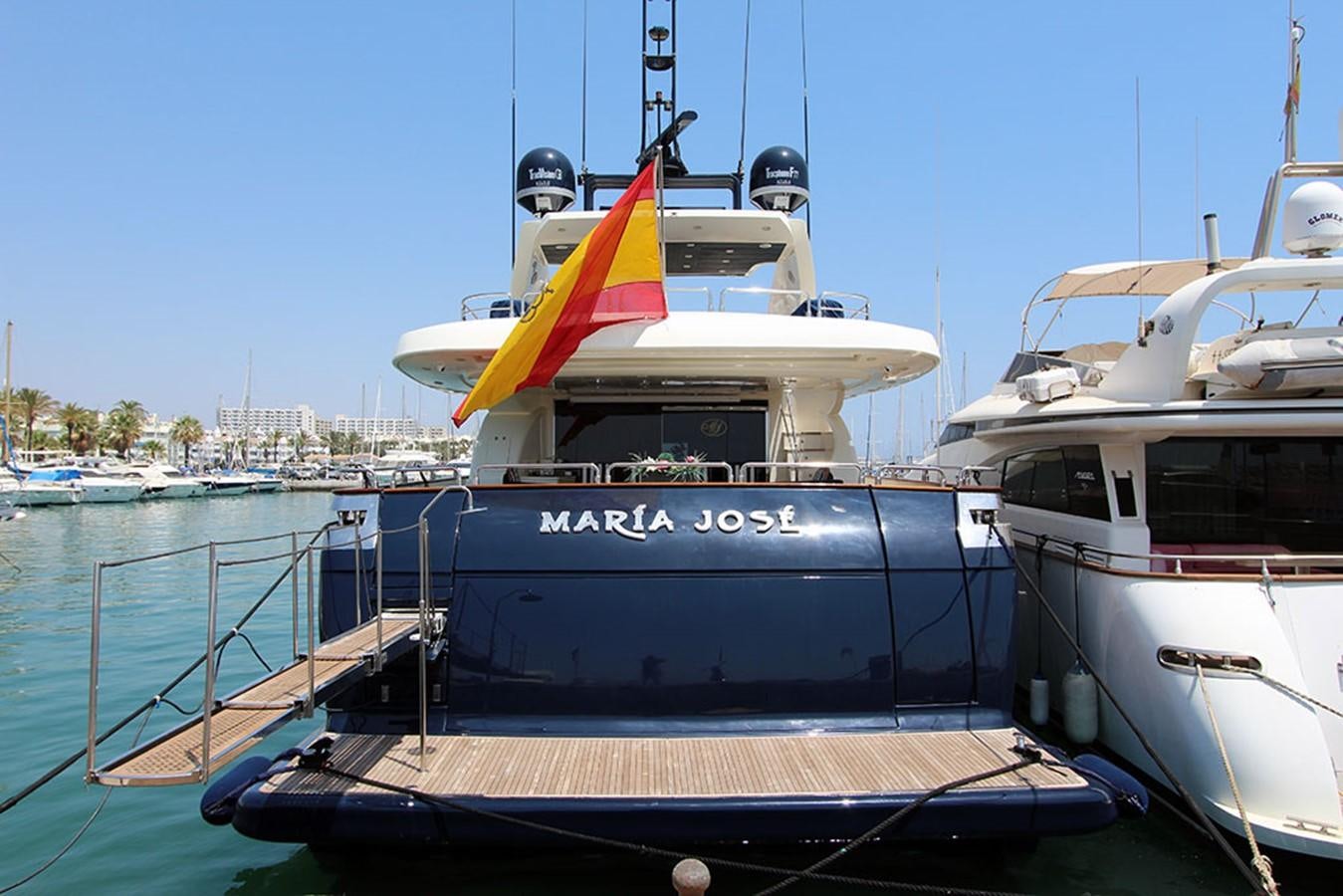 a boat docked at a pier aboard MARIA JOSE Yacht for Sale