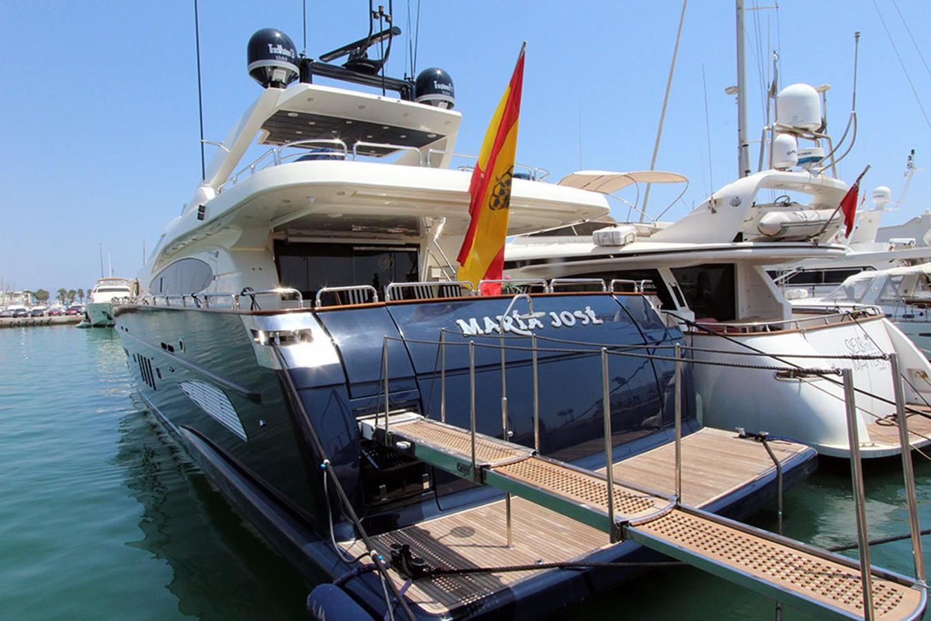 a boat docked at a pier aboard MARIA JOSE Yacht for Sale
