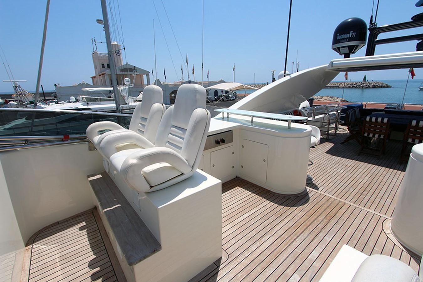 a white chair on a deck aboard MARIA JOSE Yacht for Sale