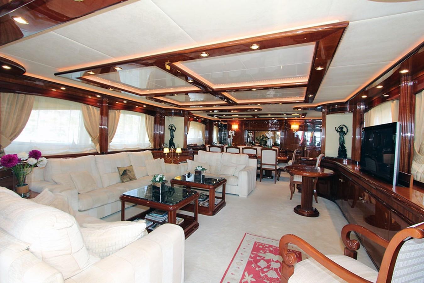 a living room with a piano aboard MARIA JOSE Yacht for Sale