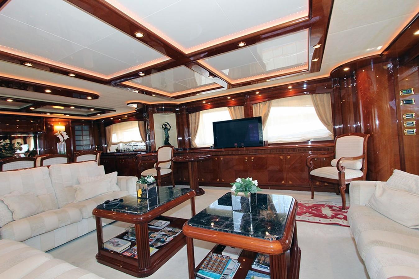 a living room with a large wood ceiling aboard MARIA JOSE Yacht for Sale