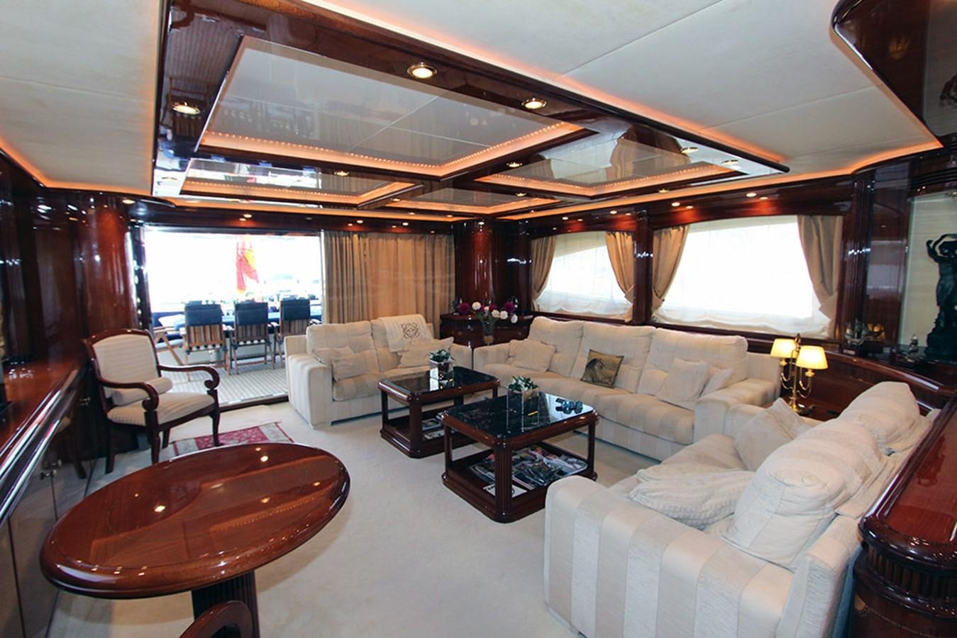 a living room with a large window aboard MARIA JOSE Yacht for Sale