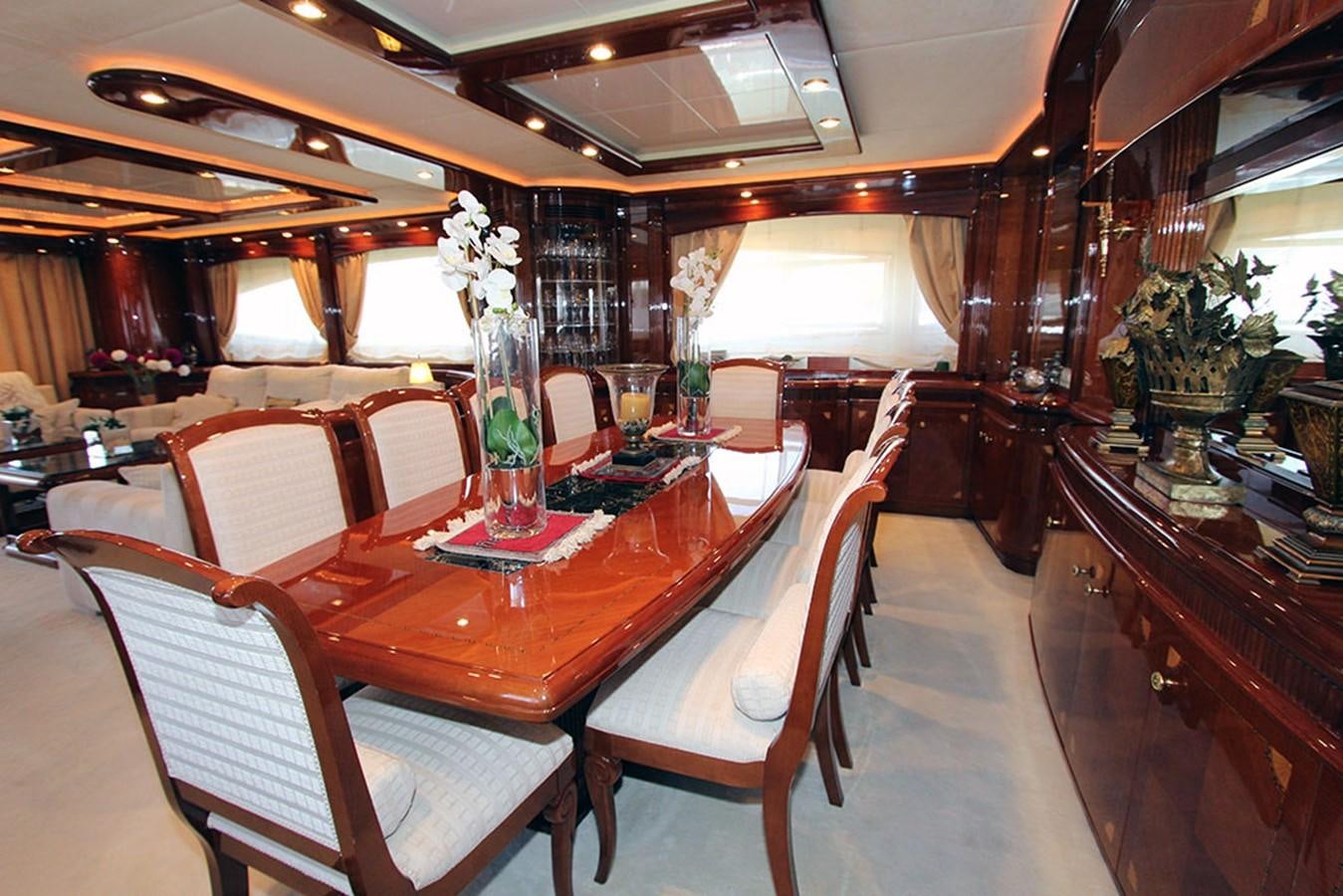 a restaurant with tables and chairs aboard MARIA JOSE Yacht for Sale