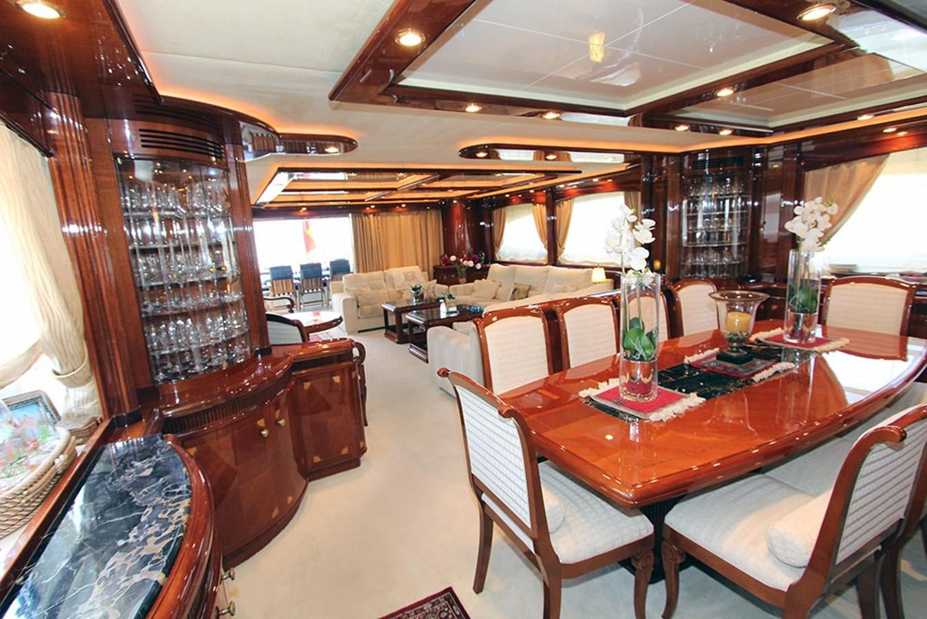 a restaurant with a table and chairs aboard MARIA JOSE Yacht for Sale