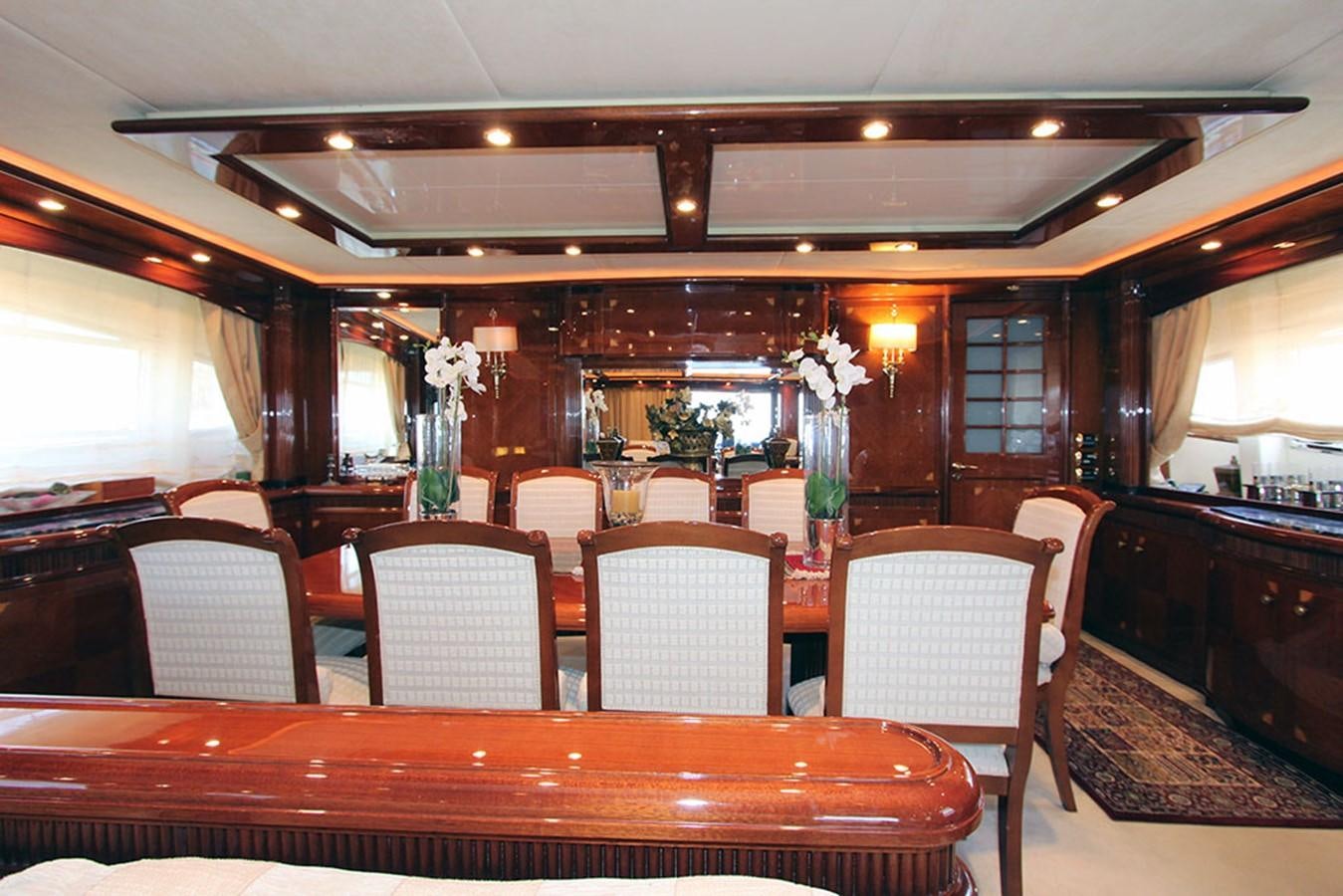 a restaurant with tables and chairs aboard MARIA JOSE Yacht for Sale