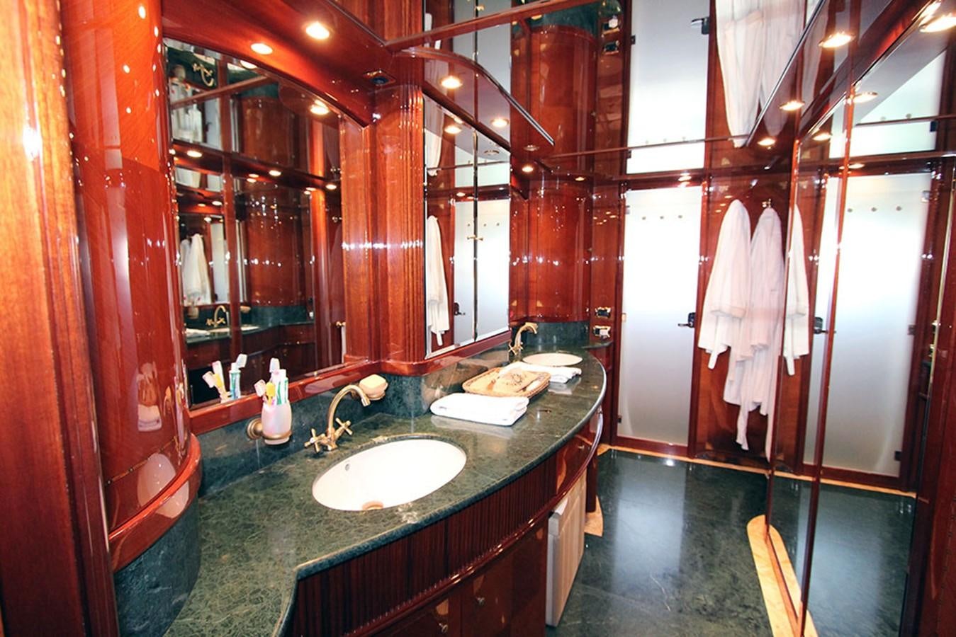 a bathroom with a countertop sink and a mirror aboard MARIA JOSE Yacht for Sale