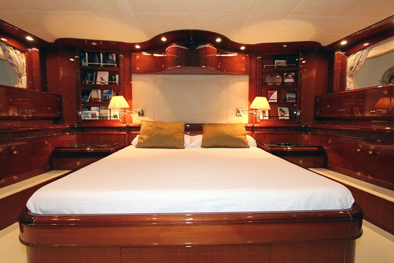 a bed with pillows on it aboard MARIA JOSE Yacht for Sale