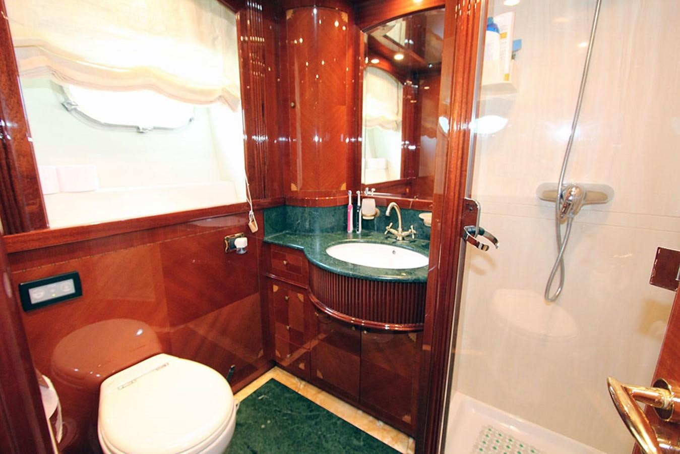 a bathroom with a sink and toilet aboard MARIA JOSE Yacht for Sale