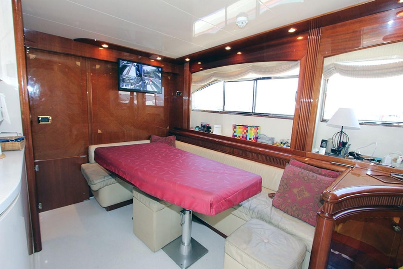 a room with a bed and a couch aboard MARIA JOSE Yacht for Sale