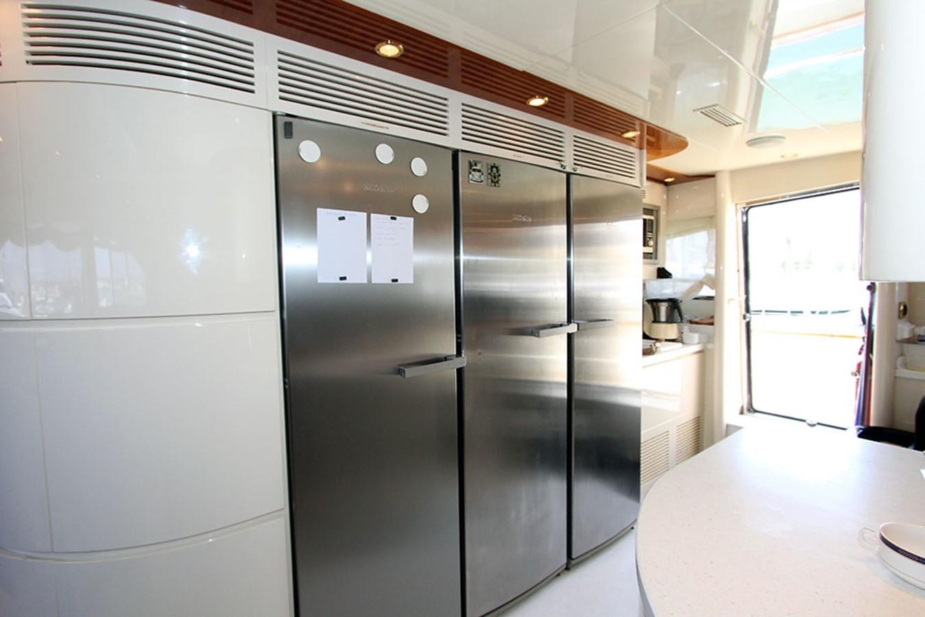 a large kitchen with stainless steel appliances aboard MARIA JOSE Yacht for Sale
