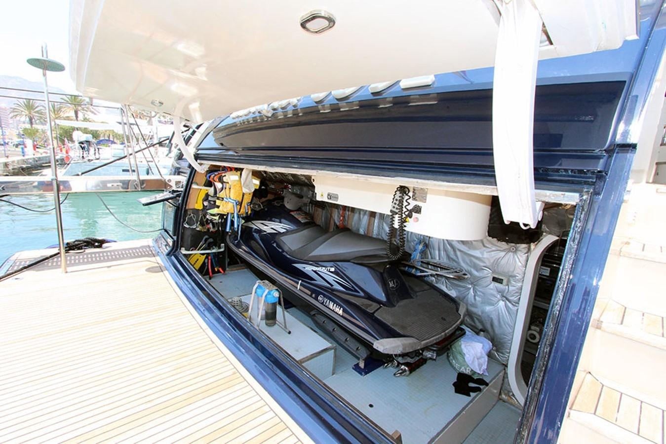 a large boat on a deck aboard MARIA JOSE Yacht for Sale