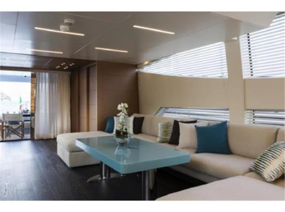 a living room with a couch and a table aboard FRANCESCA Yacht for Sale