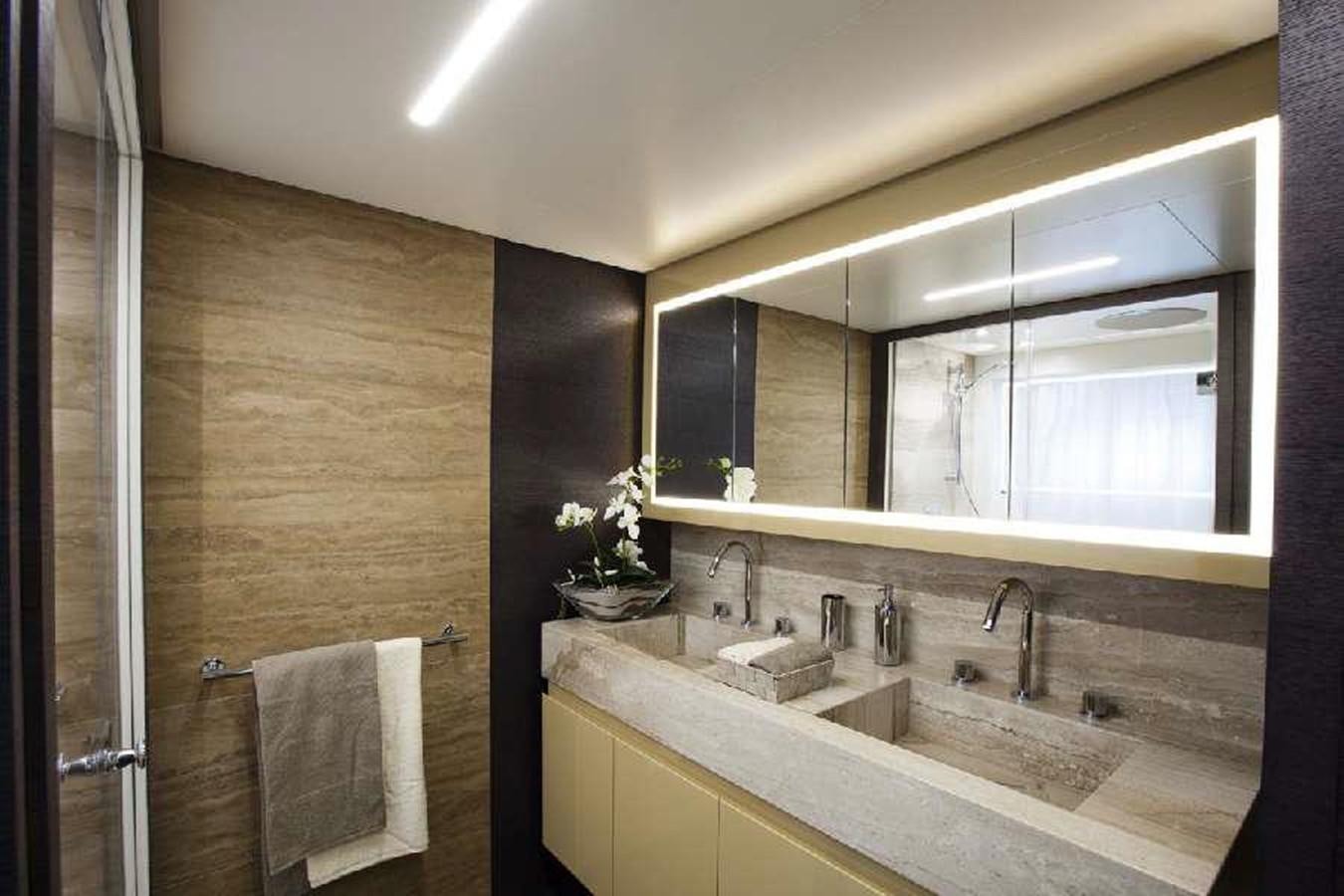 a bathroom with a sink and a mirror aboard FRANCESCA Yacht for Sale