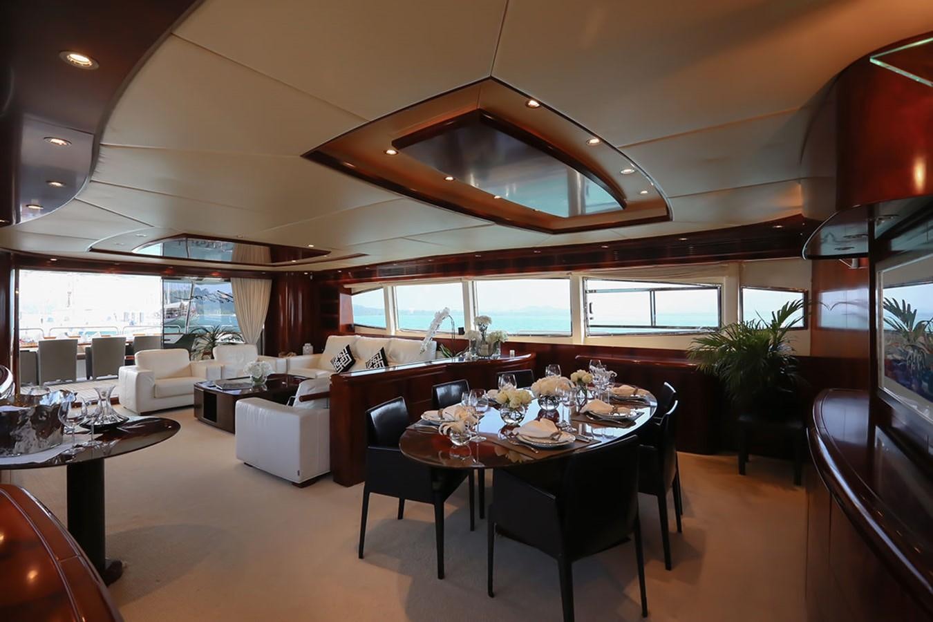 a dining room with a table and chairs aboard FOR YOUR EYES ONLY Yacht for Charter