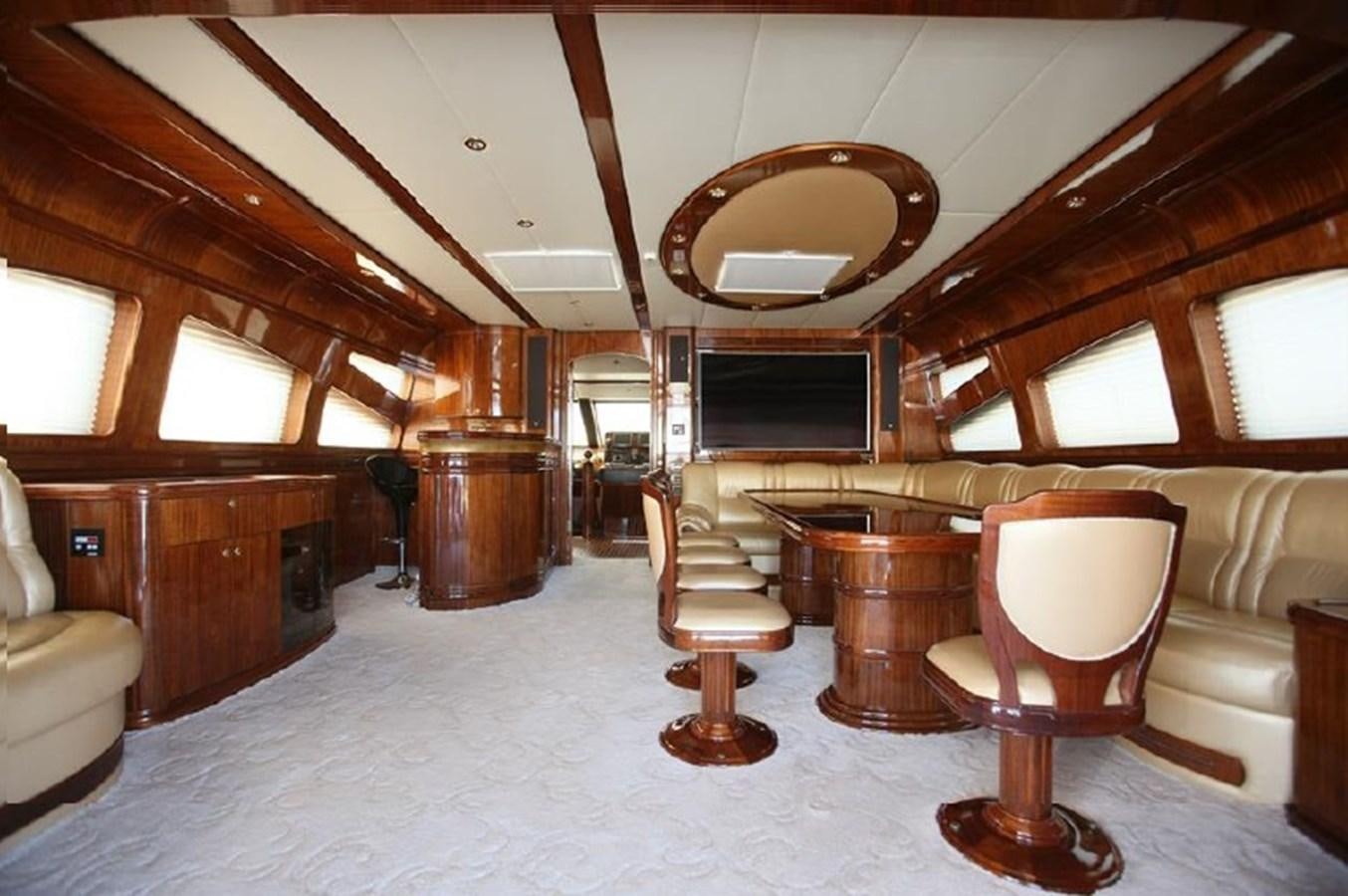 a room with a couch and a television aboard OCEAN STAR Yacht for Sale