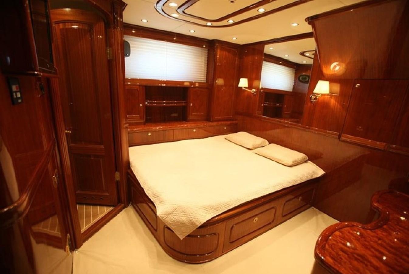 a bed in a room aboard OCEAN STAR Yacht for Sale