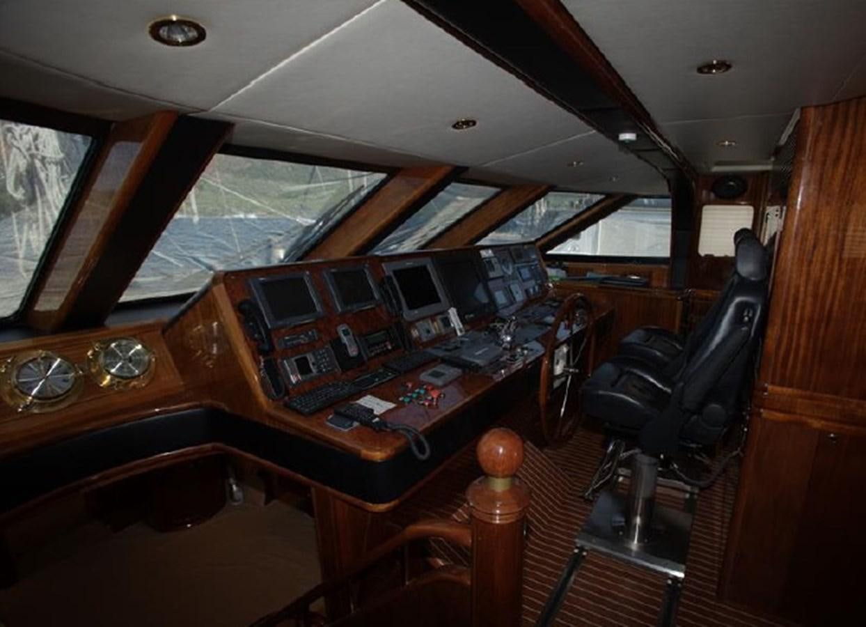 a room with a desk and computer aboard OCEAN STAR Yacht for Sale