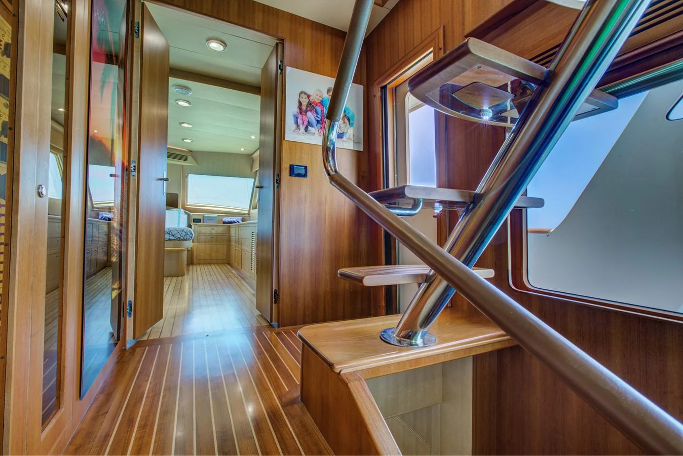 a hallway with wood floors aboard EXPLORER 97E-CB Yacht for Sale