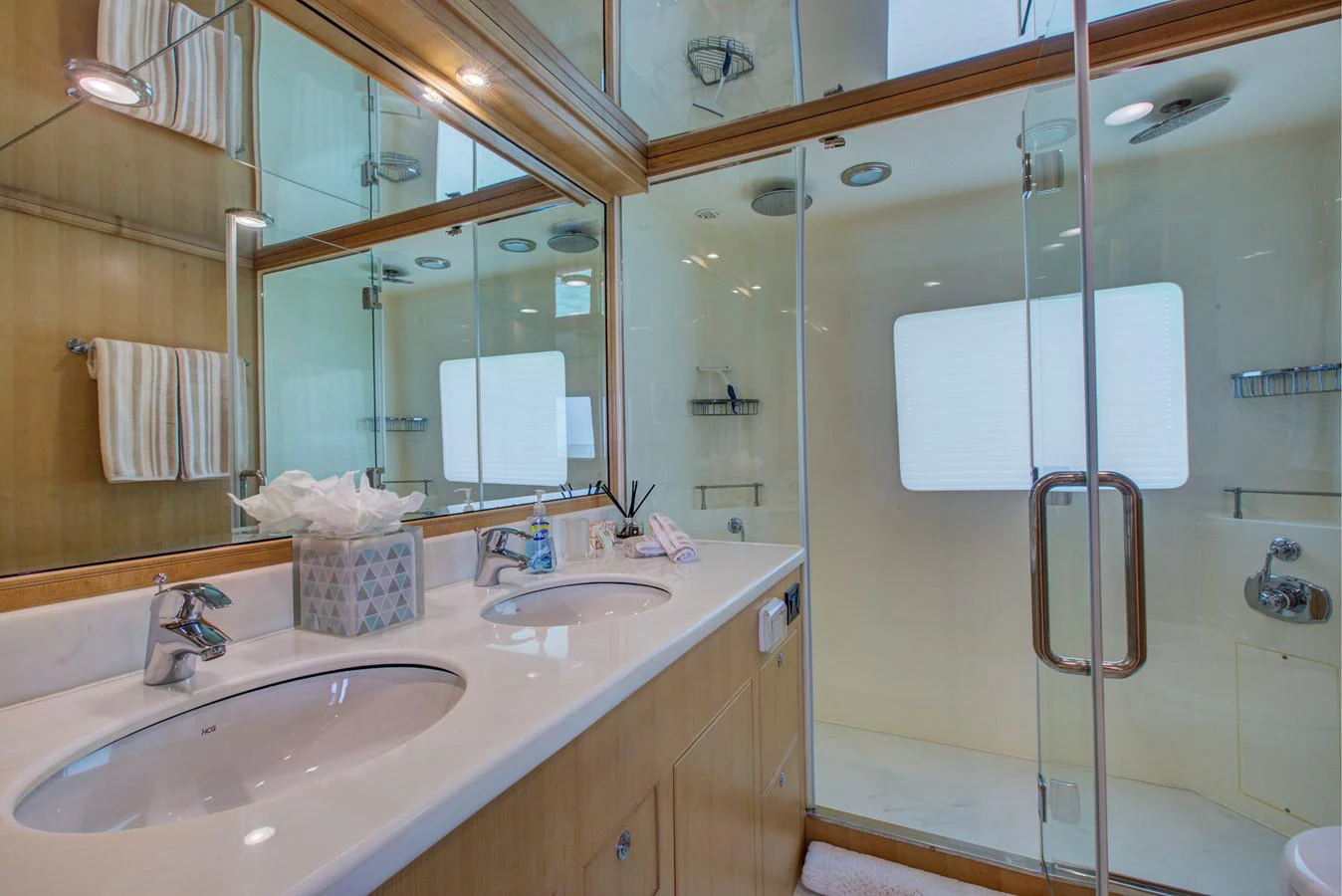 a bathroom with a standup shower aboard EXPLORER 97E-CB Yacht for Sale