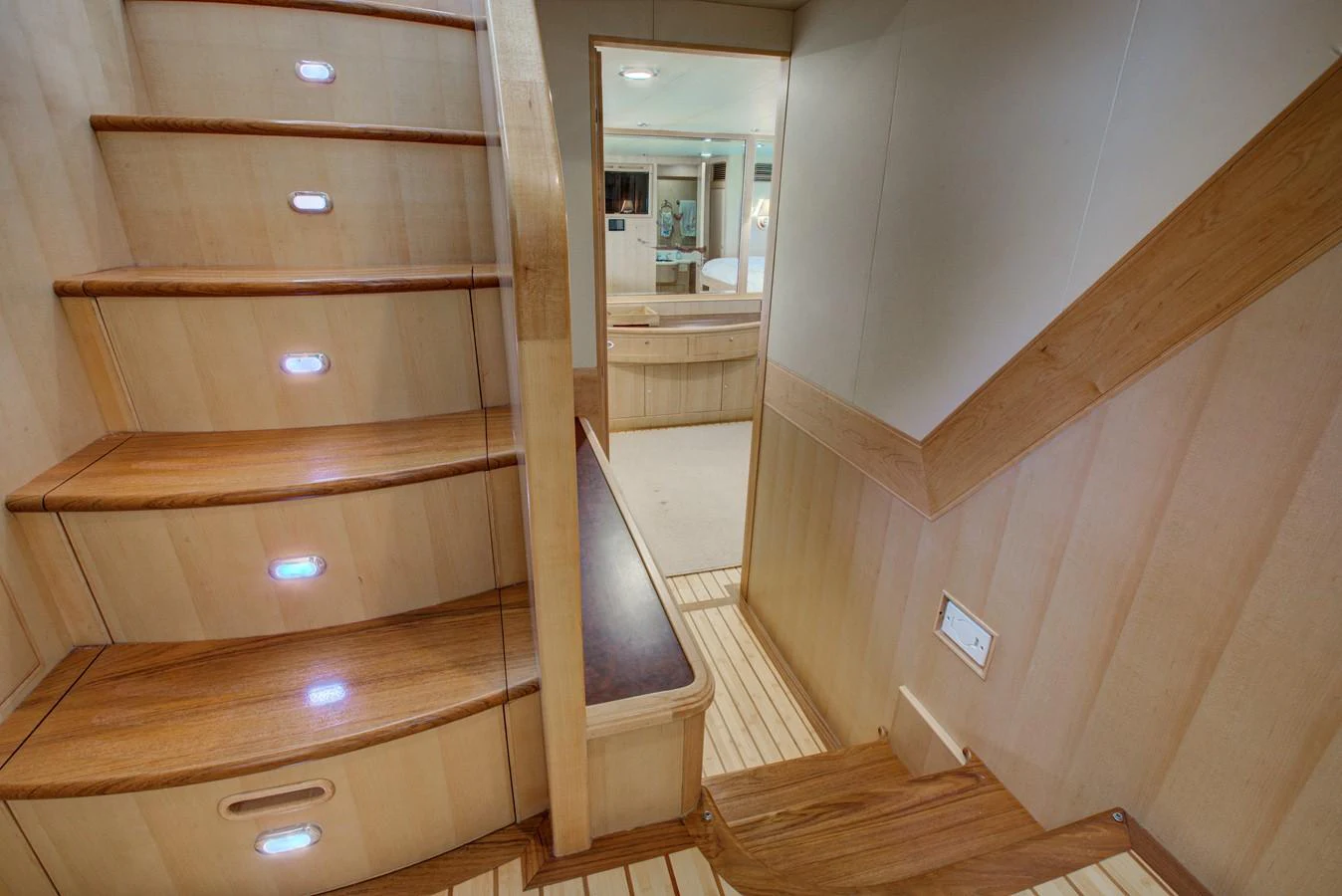 a wooden cabinet in a room aboard EXPLORER 97E-CB Yacht for Sale