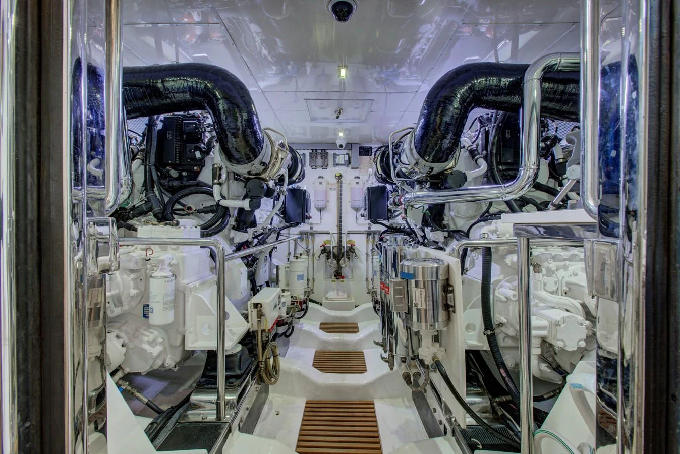 a large room with machines aboard EXPLORER 97E-CB Yacht for Sale