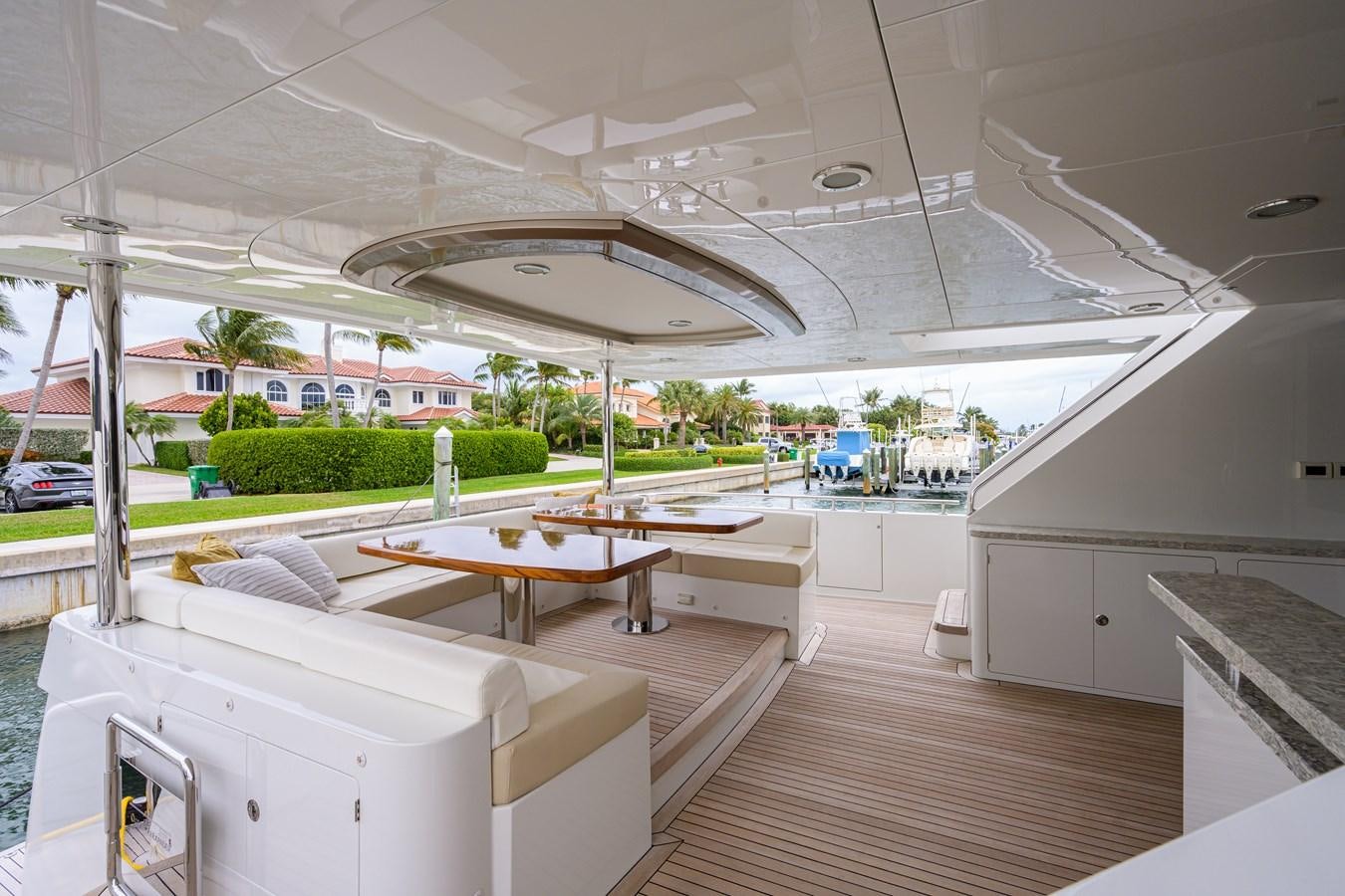 a room with a table and chairs aboard ZEPHYR Yacht for Sale