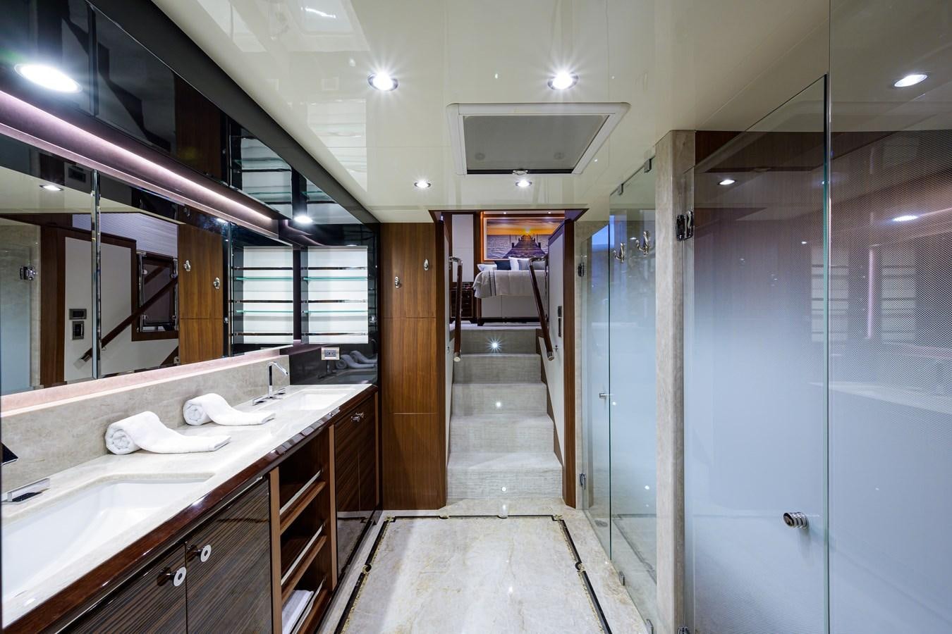 a bathroom with a countertop sink and a mirror aboard ZEPHYR Yacht for Sale