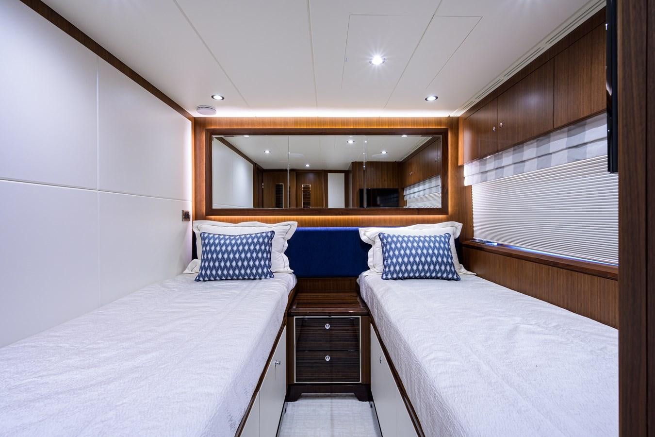 a room with two beds aboard ZEPHYR Yacht for Sale