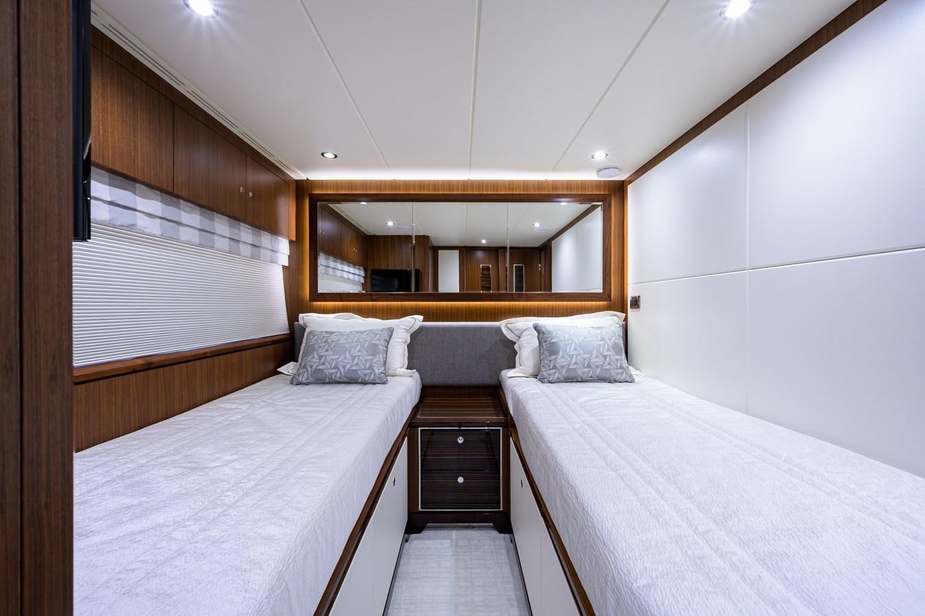 a room with two beds aboard ZEPHYR Yacht for Sale