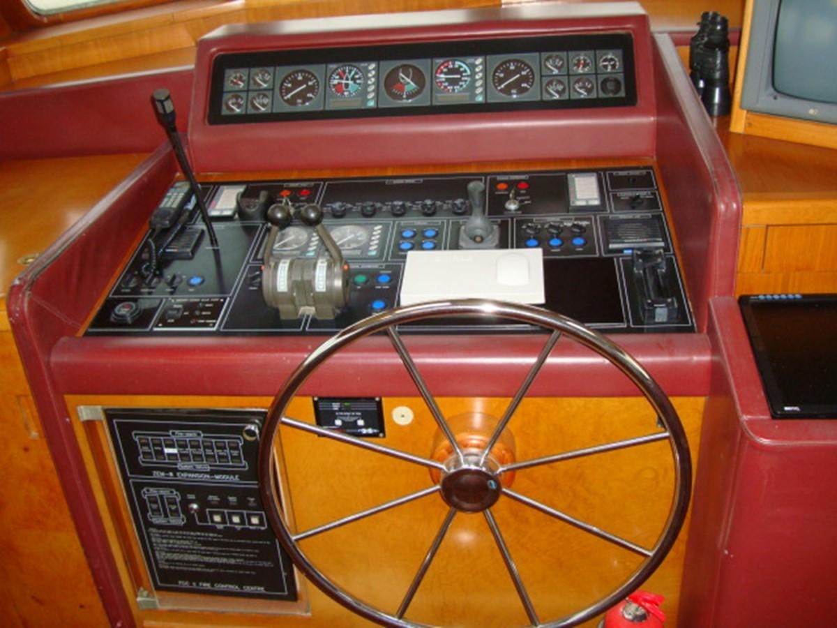 a red and black radio aboard ADEVIYE Yacht for Sale