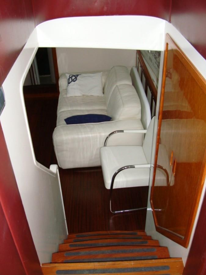 a bed with a white canopy aboard ADEVIYE Yacht for Sale