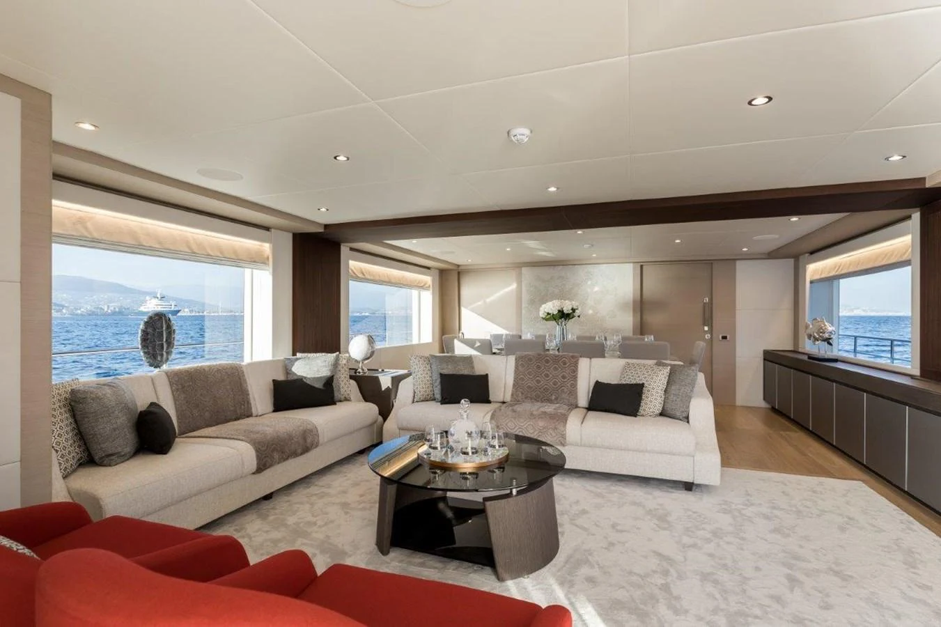 a living room with a large window aboard JEWEL Yacht for Sale