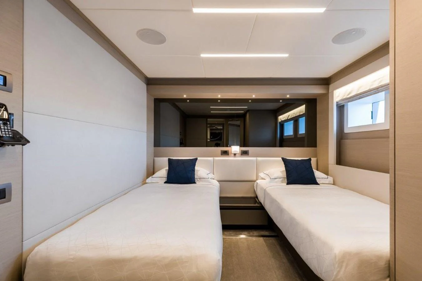 a room with two beds aboard JEWEL Yacht for Sale
