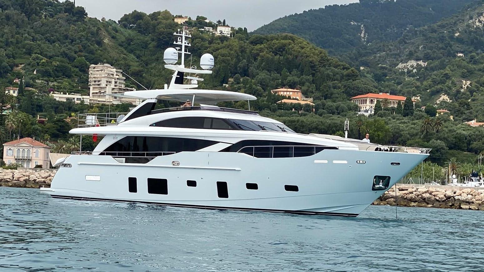a white yacht on the water aboard PRINCESS M Yacht for Sale