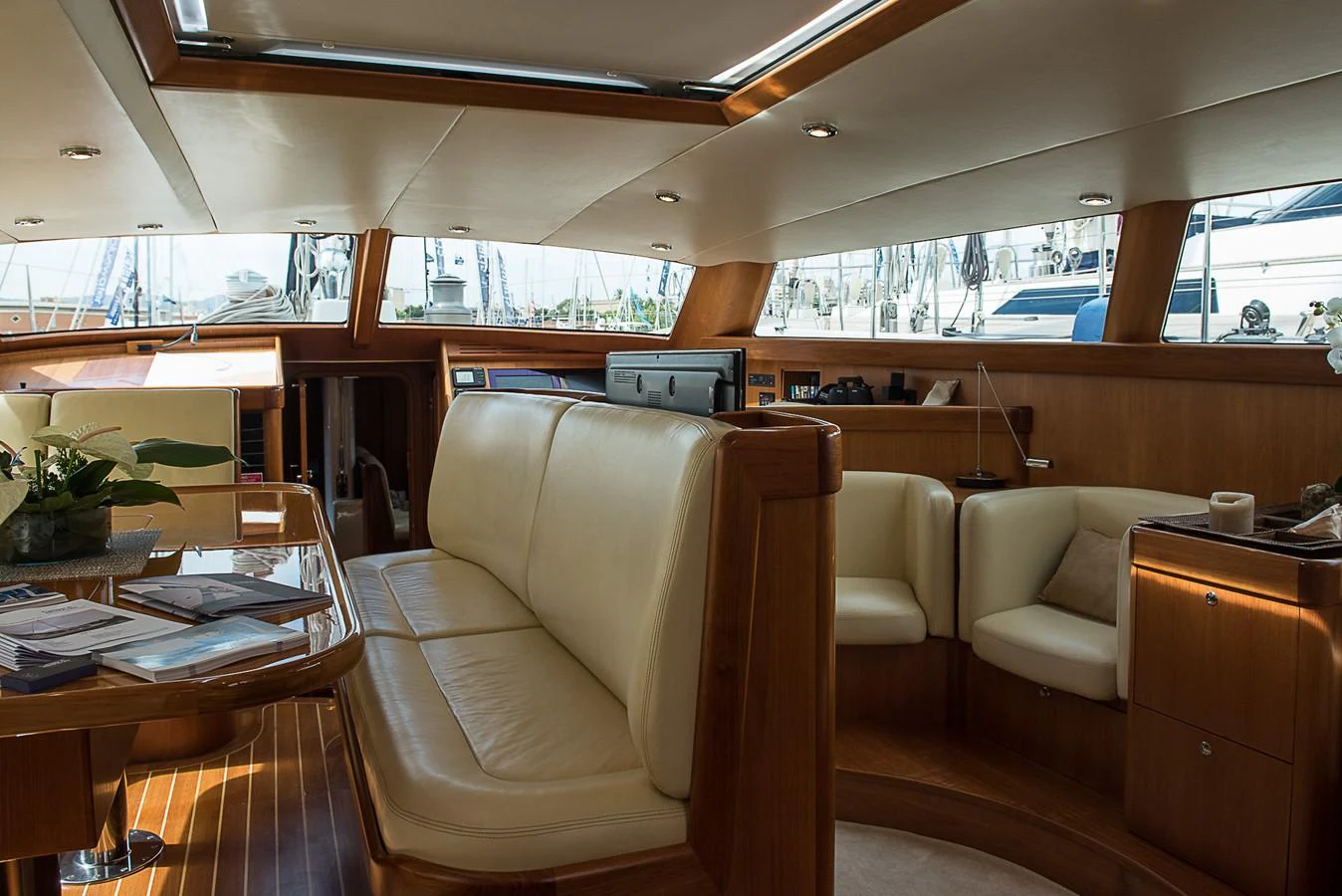 a room with a couch and a table aboard SINDONEMO Yacht for Sale