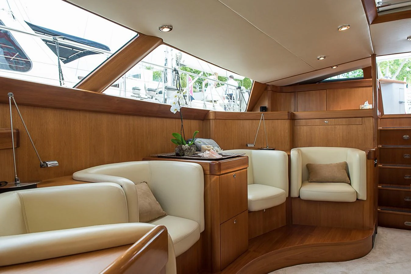 a room with a desk and chairs aboard SINDONEMO Yacht for Sale