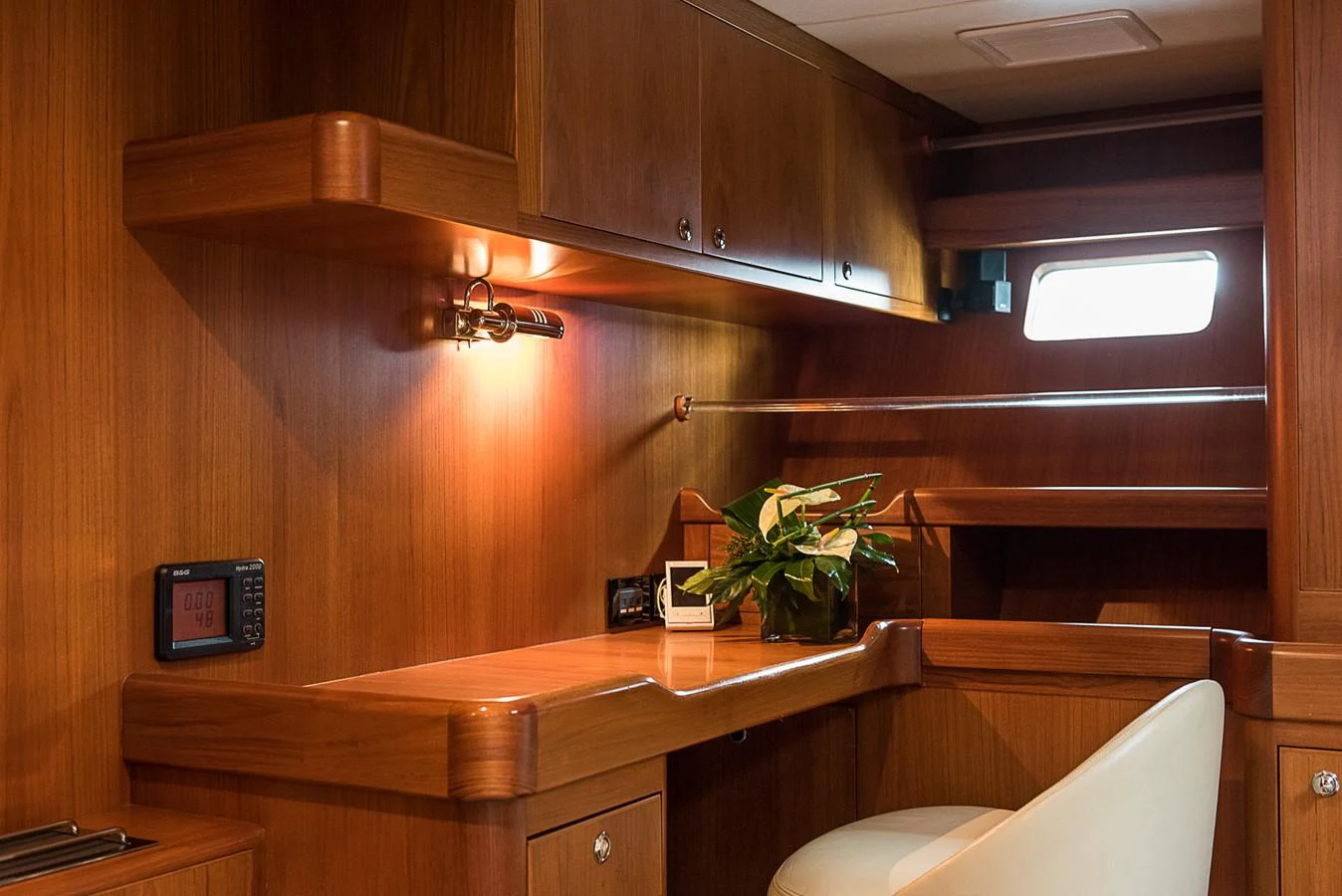 a room with a desk and a chair aboard SINDONEMO Yacht for Sale