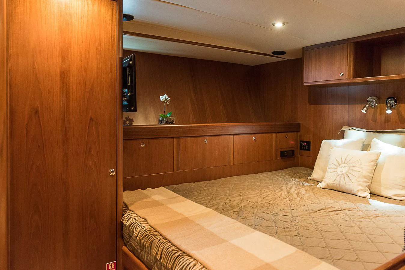 a bed in a room aboard SINDONEMO Yacht for Sale