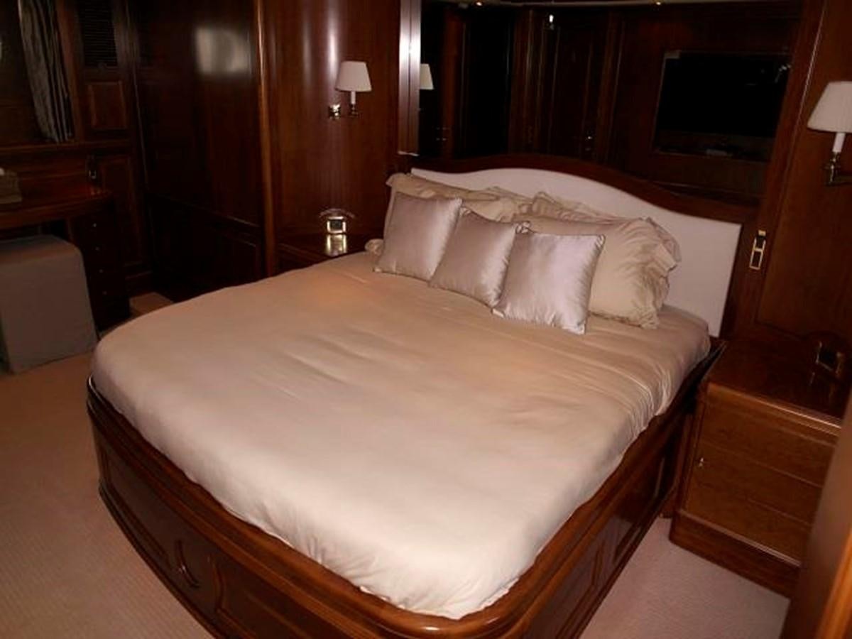 a bed with pillows aboard BENETTI TRADITION 100 Yacht for Sale