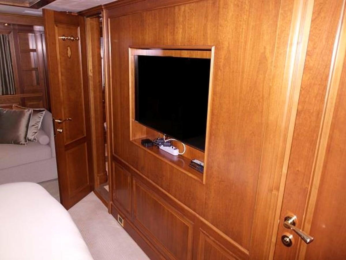 a tv on a wall aboard BENETTI TRADITION 100 Yacht for Sale