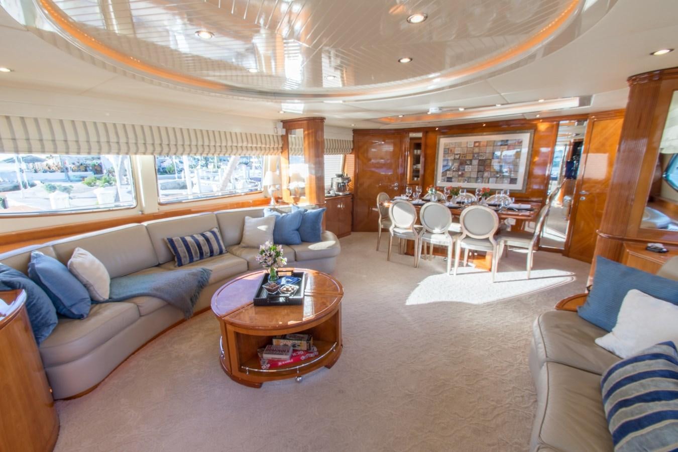 a living room with a large window aboard NO NAME AZIMUT 100 JUMBO Yacht for Sale