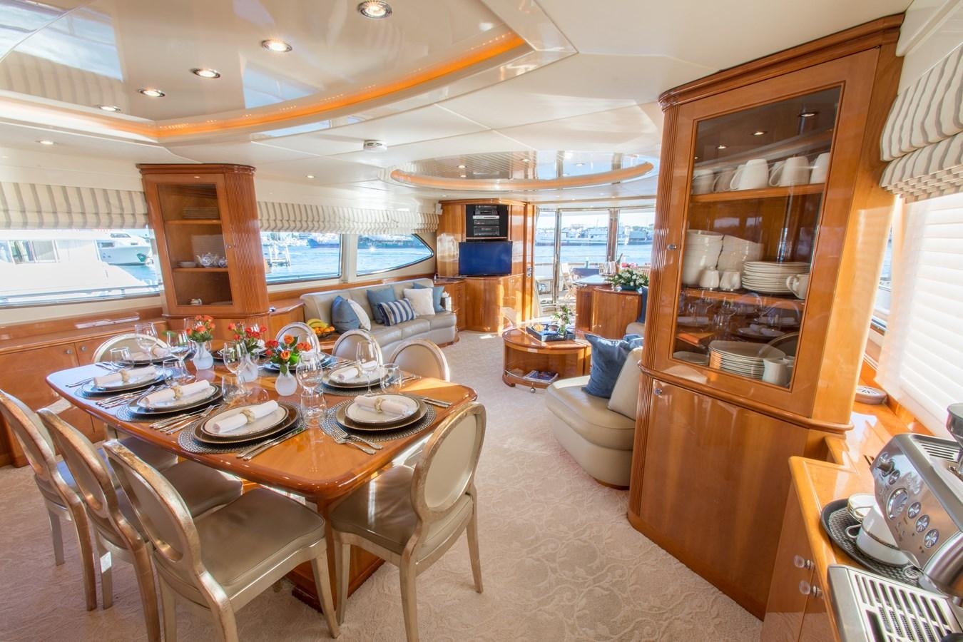 a dining room with a large window aboard NO NAME AZIMUT 100 JUMBO Yacht for Sale